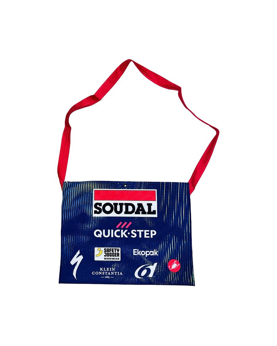 A Soudal Quick-Step branded blue and white musette with a red shoulder strap, shown on a plain white background.